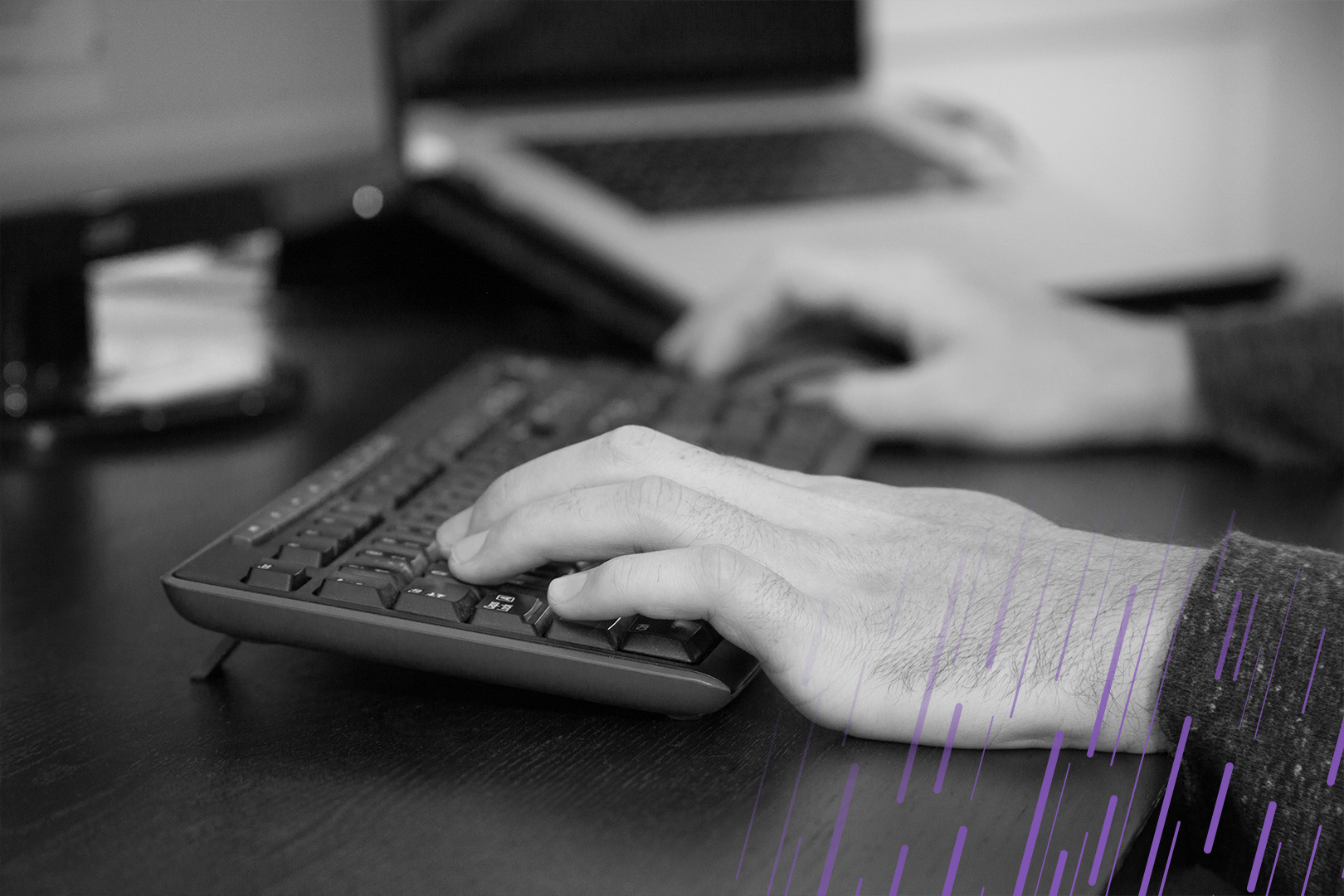 Close up of hands on keyboard